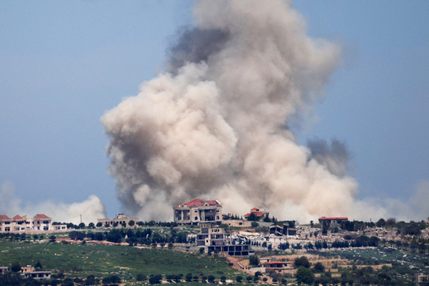 Israel says it will attack Hizbollah ‘forcefully’ as four killed in Lebanon